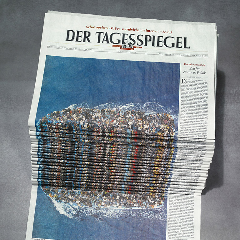 Newspaper Stack - Refugees